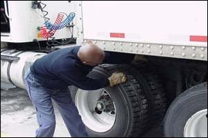 Before - Reaching under the trailer to pull the 5th wheel release